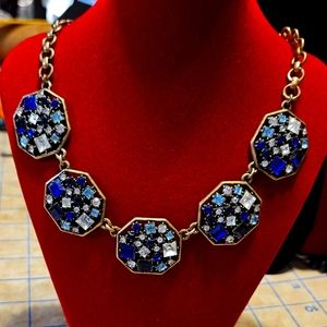 Vintage J Crew gold chain necklace with 5 octagon shape charms in blue crystals.